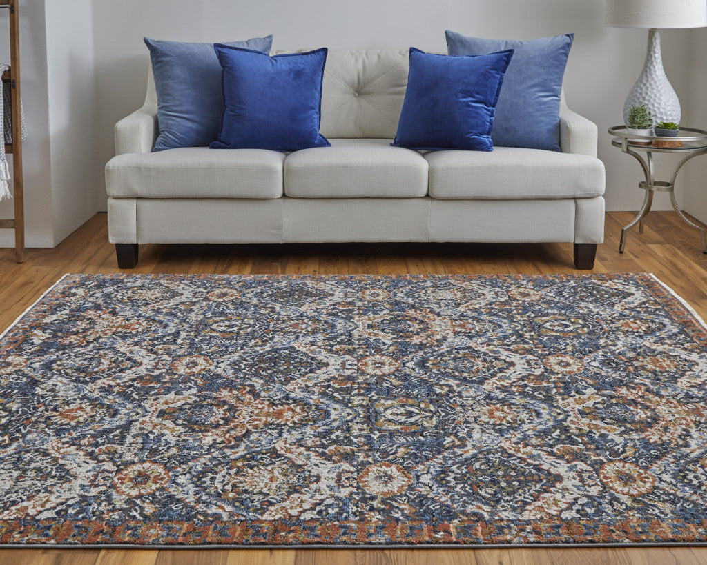 10 x 13 Blue Orange & Ivory Floral Power Loom Rug With Fringe