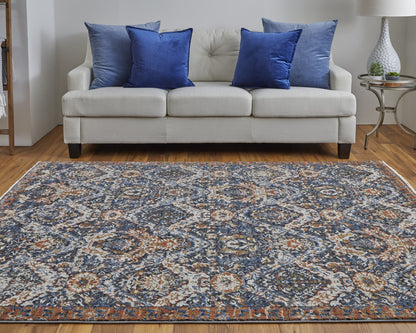 10 x 13 Blue Orange & Ivory Floral Power Loom Rug With Fringe