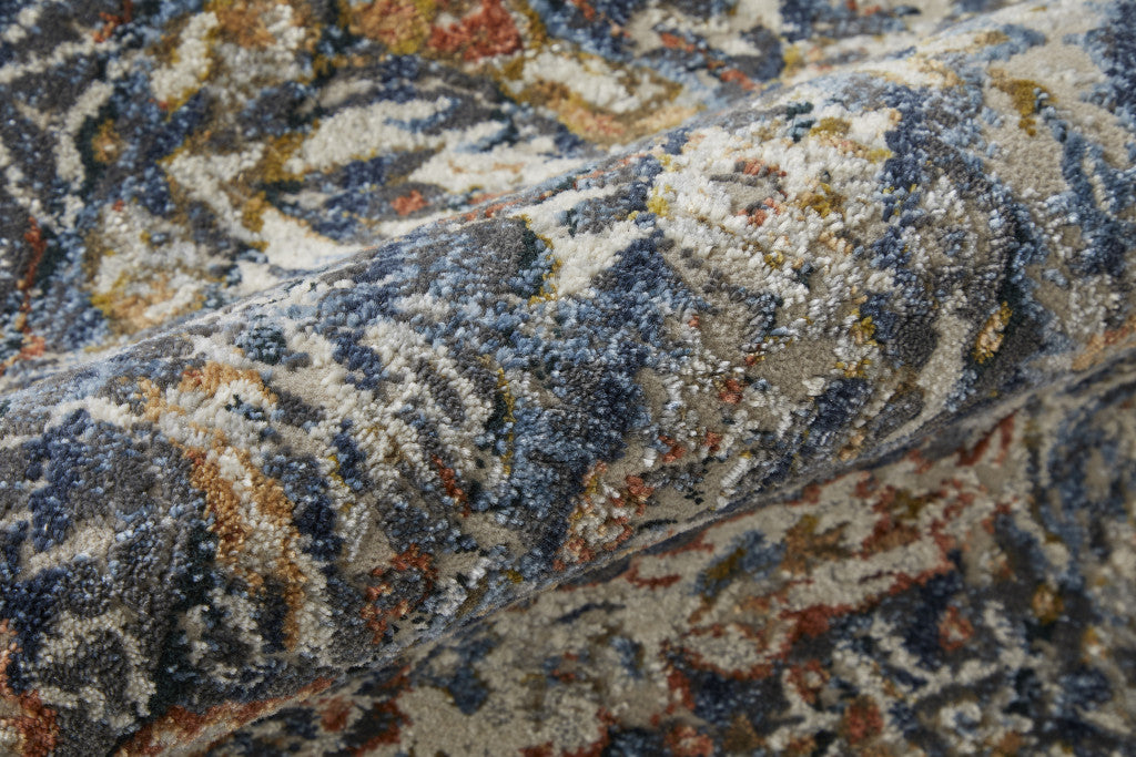 10 x 13 Blue Orange & Ivory Floral Power Loom Rug With Fringe