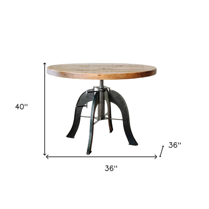 Brown And Black Rounded Solid Wood And Steel Pedestal Base Dining Table