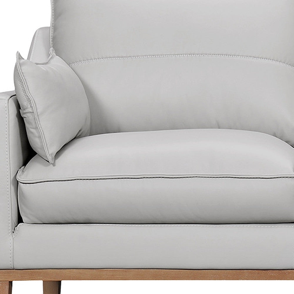Gray Leather Sofa & Toss Pillows With Brown Legs