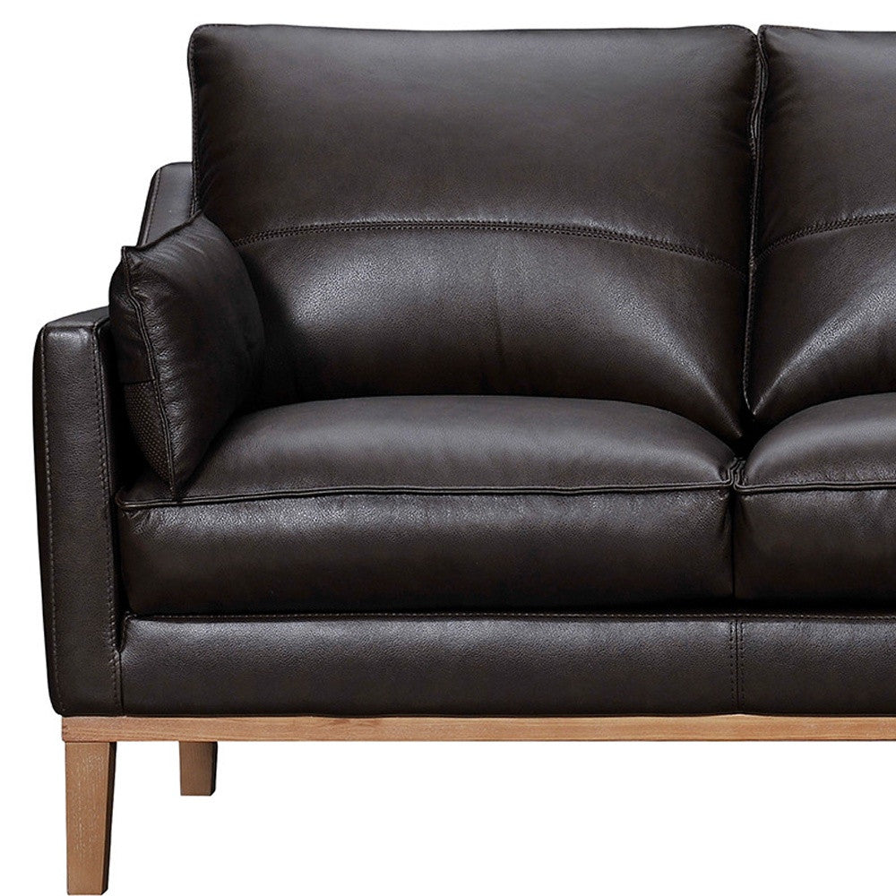 Dark Brown Leather Sofa & Toss Pillows With Brown Legs