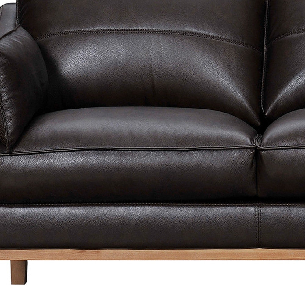Dark Brown Leather Sofa & Toss Pillows With Brown Legs