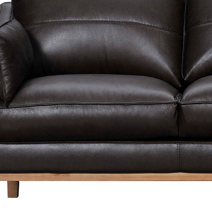 Dark Brown Leather Sofa & Toss Pillows With Brown Legs