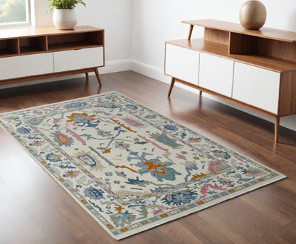 4 x 6 Blue Ivory & Pink Wool Floral Hand Knotted Rug With Fringe