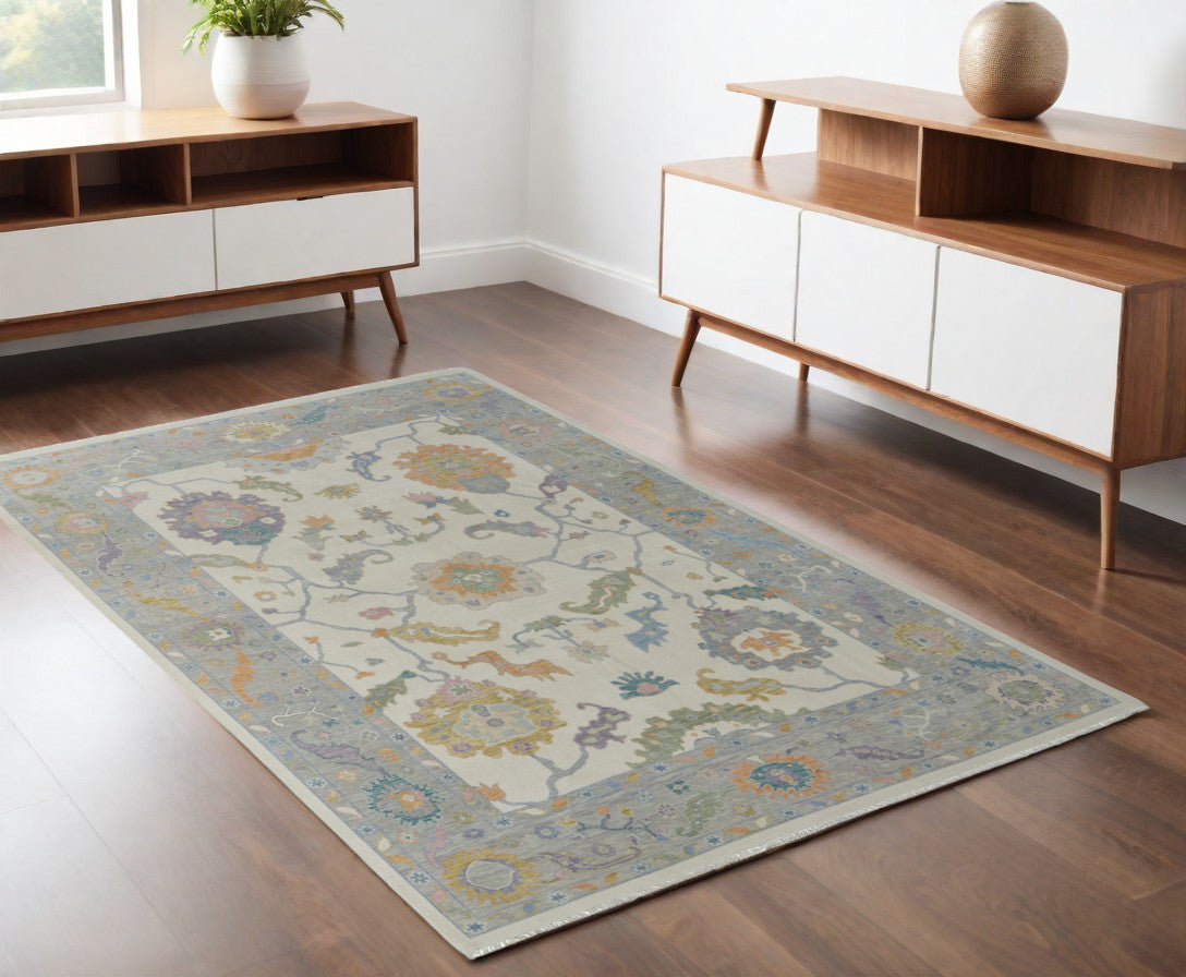 4 x 6 Gray Ivory & Orange Wool Floral Hand Knotted Rug With Fringe