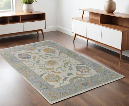 4 x 6 Gray Ivory & Orange Wool Floral Hand Knotted Rug With Fringe
