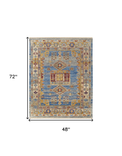 4 x 6 Blue Red & Yellow Wool Geometric Hand Knotted Rug With Fringe