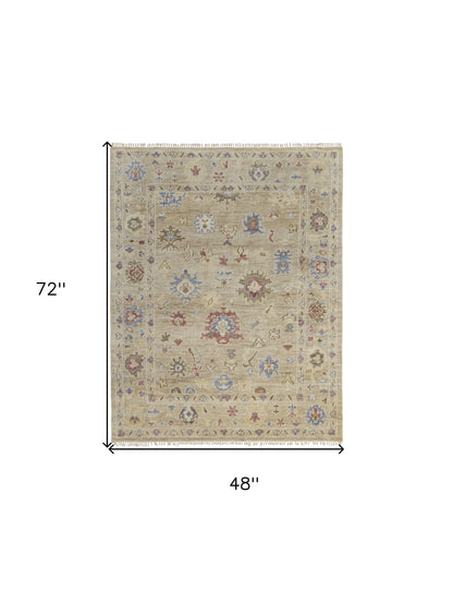 4 x 6 Tan Brown & Blue Wool Floral Hand Knotted Rug With Fringe