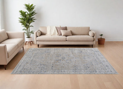 8 x 10 Ivory Taupe & Blue Oriental Power Loom Rug With Fringe