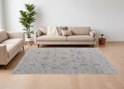 8 x 10 Ivory Taupe & Blue Floral Power Loom Rug With Fringe