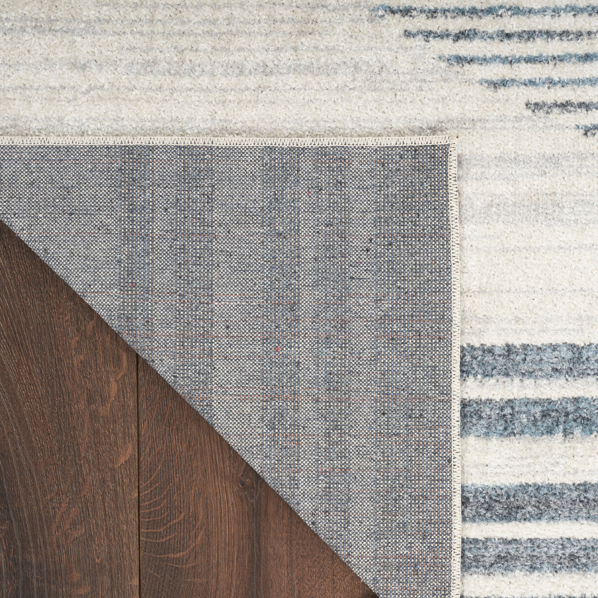 Nourison Astra Ivory & Blue Pet Friendly Machine Washable Rug - Corner