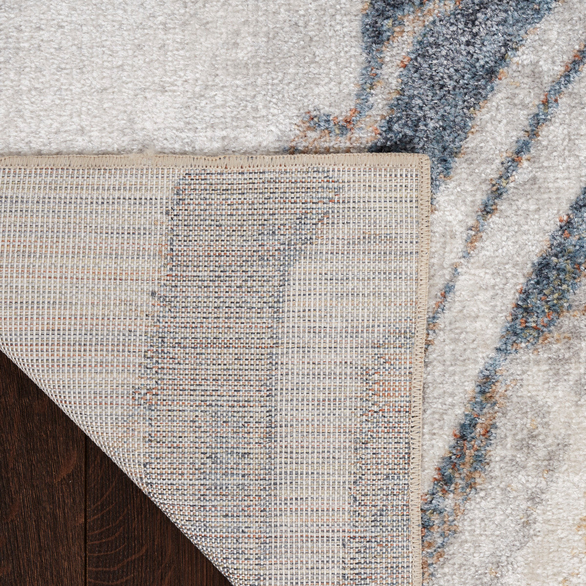 Nourison Astra Ivory & Blue Pet Friendly Machine Washable Rug - Corner