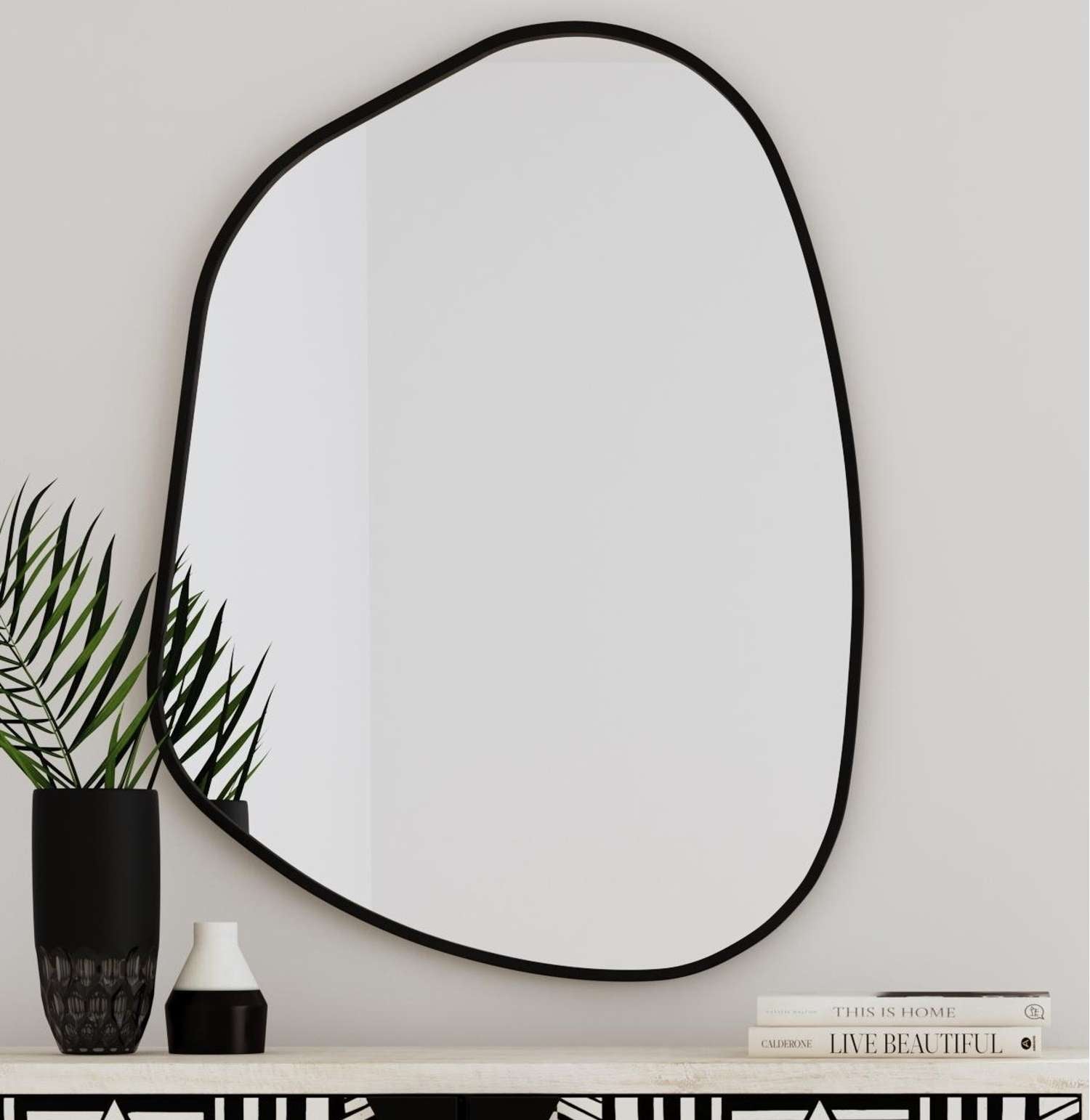 Karaniya 30" Asymmetrical Black Wall Mirror - Room Scene
