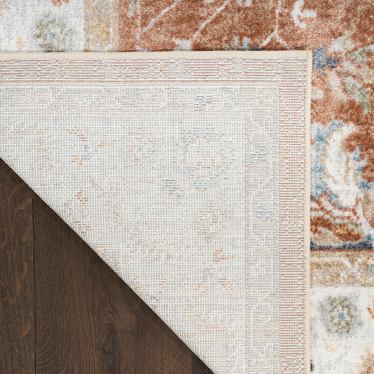 Nourison Astra Rust & Ivory Pet Friendly Machine Washable Rug - Corner