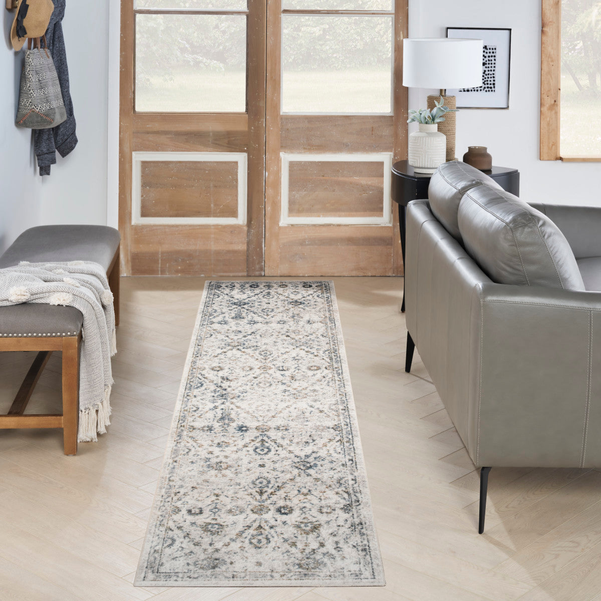 Nourison Astra Ivory & Blue Pet Friendly Machine Washable Rug - Room Scene