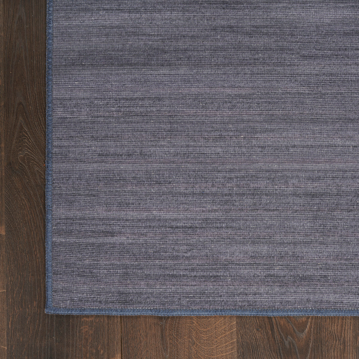 Nourison Essentials Loom Woven Navy Machine Washable Rug - Corner
