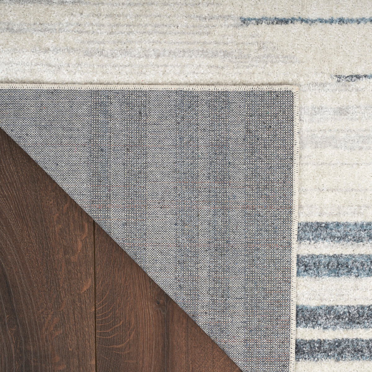 Nourison Astra Ivory & Blue Pet Friendly Machine Washable Rug - Corner