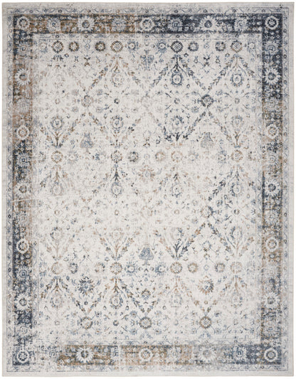Nourison Astra Ivory & Blue Pet Friendly Machine Washable Rug - 6'7" x 9'