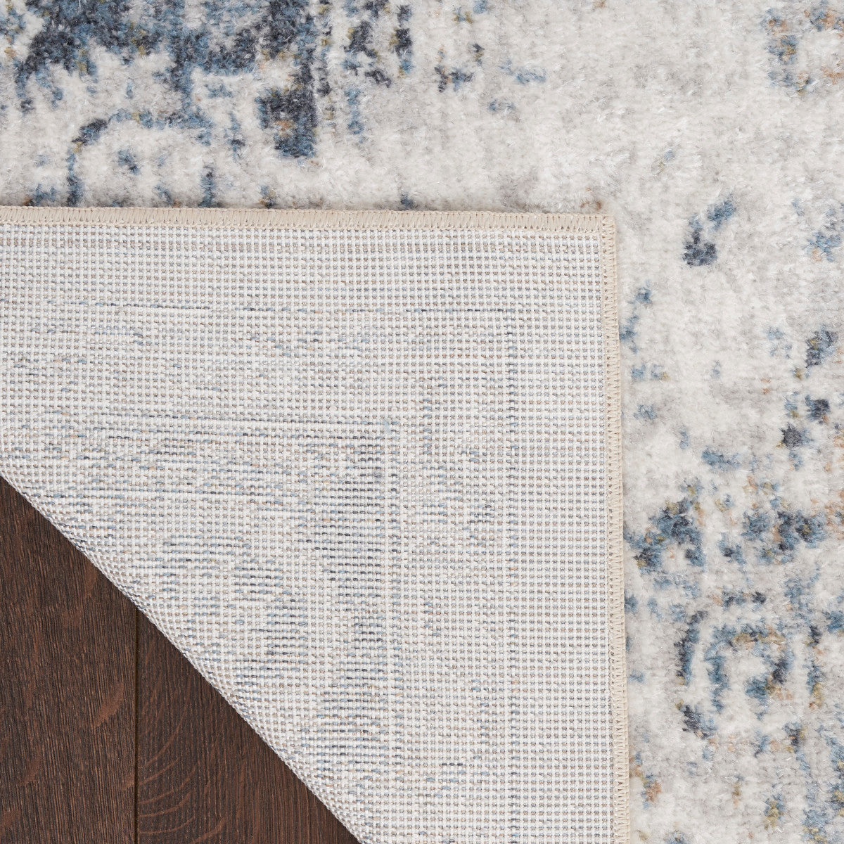 Nourison Astra Ivory & Blue Pet Friendly Machine Washable Rug - Corner