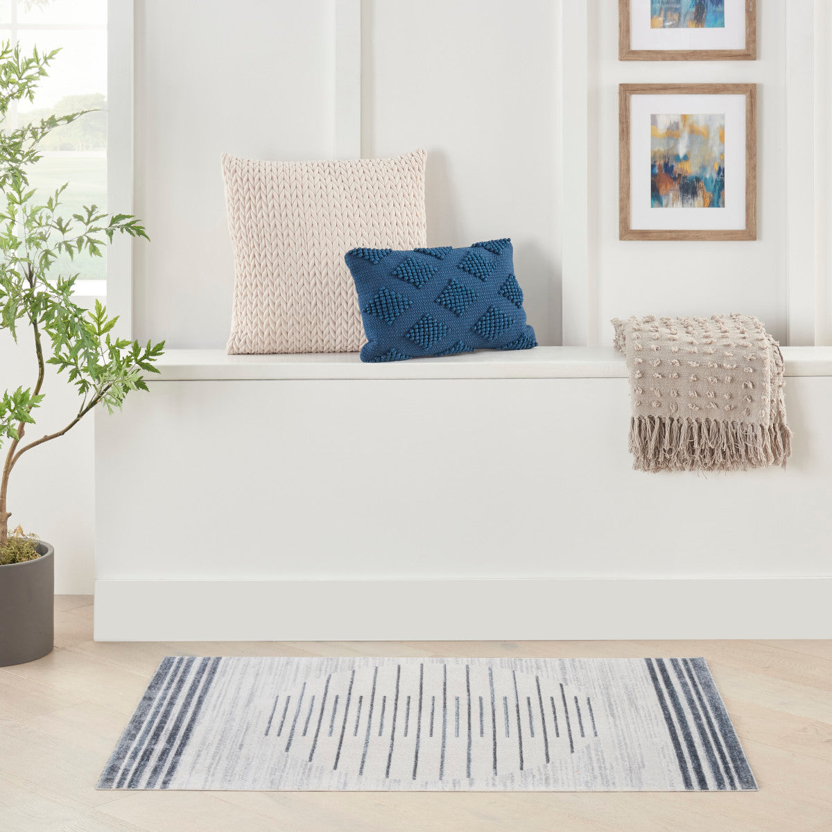 Nourison Astra Ivory & Blue Pet Friendly Machine Washable Rug - Room Scene